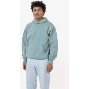 A light green hooded pullover made from heavy fleece, featuring a kangaroo pocket and ribbed cuffs.