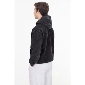 A heavy fleece hooded pullover in mineral wash grey, featuring a hood and casual fit. It has branding on it.