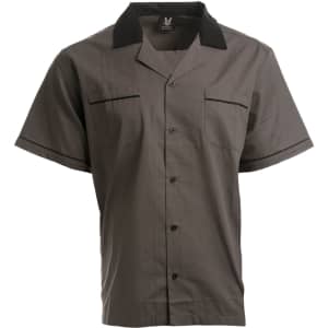 A button-up shirt in grey with a black collar and two chest pockets. It features a branded logo.