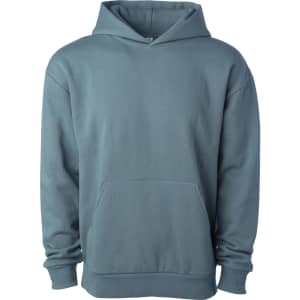 A pullover hoodie in a soft blue-grey colour featuring a large front pocket and a hood. It has a logo on the side.