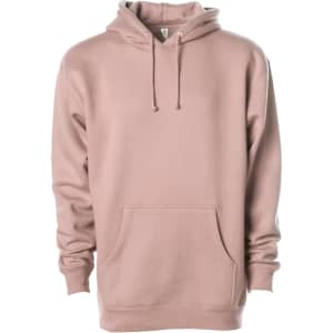 A heavyweight pullover hood in a soft pink shade, featuring a front pocket and a drawstring hood. It has a logo.