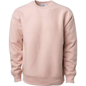 A heavyweight crew sweatshirt in a soft pink colour, featuring a ribbed collar and cuffs. It has a logo on the label.