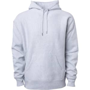 A heavyweight hoodie in light grey with a front pocket and adjustable drawstring hood, featuring a logo.