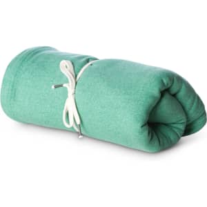 A rolled green stadium blanket secured with a white cord, featuring a smooth texture and a simple design.