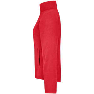 A red microfleece jacket featuring a high collar and side pockets, displayed from a side view.