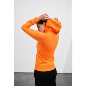 A bright orange ladies hooded sweatshirt with a fitted design, featuring a hood and a sleek silhouette.