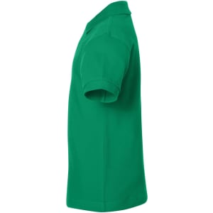 A green polo shirt featuring short sleeves and a collar, with a logo present on the fabric.