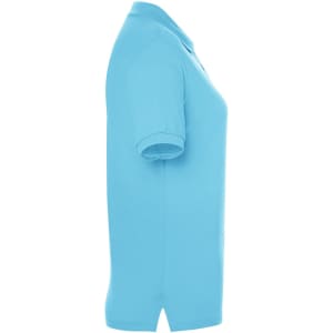 A light blue polo shirt for ladies, featuring a classic design and a collar. It has a logo on the side.