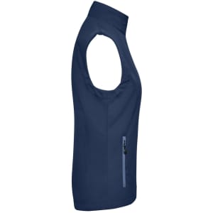A navy blue ladies softshell vest with a zippered pocket and no sleeves, featuring a logo.