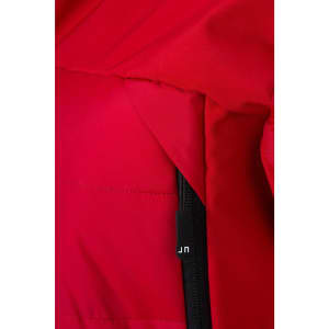 A close-up of a red men's outdoor hybrid jacket, highlighting the soft shell fabric and zipper. It features a logo tag.