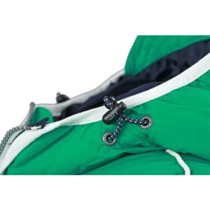 A close-up of a green maritime vest featuring a zippered collar and drawstring adjustments. It includes a logo.
