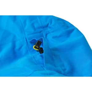 A bright blue outdoor jacket featuring a zippered pocket and toggles on the hood. It includes a logo.