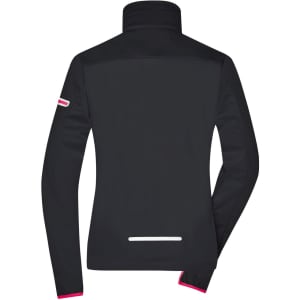 A black ladies' softshell jacket with a high collar, featuring pink accents and a small logo.