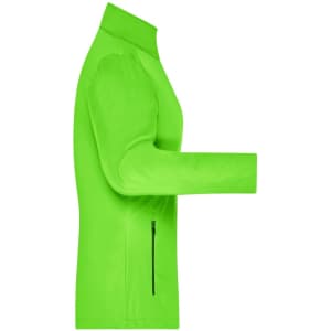 A bright green ladies softshell jacket featuring a zip pocket and a sleek design. It has a logo on the sleeve.