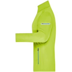 A ladies' softshell jacket in bright lime green colour with a zip pocket and contrasting blue details.