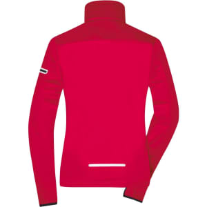 A ladies sports softshell jacket in bright red with a high collar and minimalistic design featuring a logo.