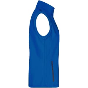 A blue ladies softshell vest with a zip pocket and a logo on the side. Suitable for layering.
