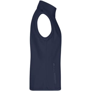 A navy blue women's softshell vest with a zippered side pocket and sleeveless design, featuring a logo.