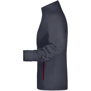 A softshell jacket in navy with red accents, featuring a stand-up collar and zippered side pockets.