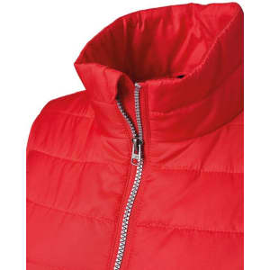 A red padded vest featuring a high collar and a front zip, with a small logo on the side.