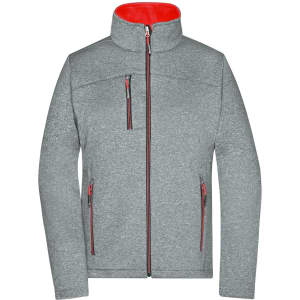 A grey softshell jacket with red inner lining and zippers, featuring a high collar and multiple pockets.