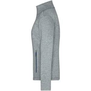 A grey ladies softshell jacket featuring a stand-up collar and a side zip pocket with a logo.