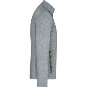 A men's softshell jacket in grey, featuring a front zip and side zip pocket. Includes a logo on the fabric.
