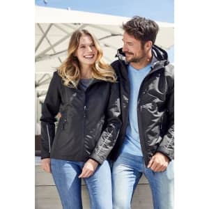 A black ladies' 3-in-1 jacket with a hood, displayed on a woman and a man outdoors. The woman is smiling.