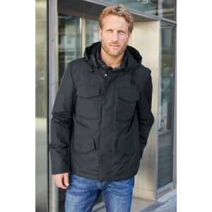 A men's black business jacket featuring a hood and multiple pockets, worn by a model outdoors.