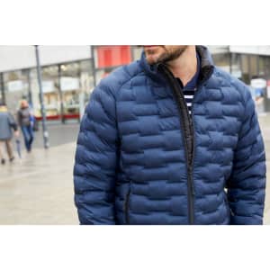 A men's modern padded jacket in navy blue, featuring a zip front and a quilted design. The jacket has a logo on it.