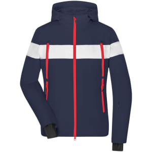A navy blue soft shell jacket with white and red stripes, featuring multiple zippered pockets and a hood.