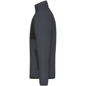 A men's polar fleece jacket in navy blue with a black chest pocket and side zippers, featuring a logo.