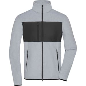 A men's fleece jacket featuring a grey body with a black panel across the chest and zippered pockets.
