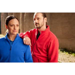 A blue and a red bonded fleece jacket worn by a man and a woman, both featuring a zip and collar design.