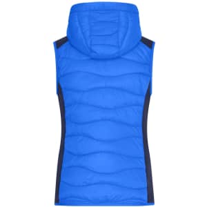 A blue hybrid vest with a hood, featuring a quilted design and dark navy side panels. It has branding present.