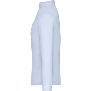 A pale blue ladies shirt with long sleeves and a collar, featuring a logo on the chest area.