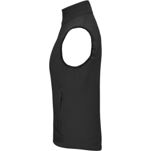 A black ladies softshell vest featuring a high collar and a zippered pocket on the side, with a logo on it.