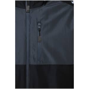 A padded hardshell workwear jacket in dark grey and black, featuring a zip pocket and a logo.