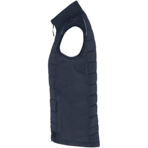 A navy blue ladies hybrid vest with a quilted design and zippered pockets, featuring a logo.