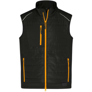 A black hybrid vest featuring yellow zip details and pockets. It has an adjustable collar and reflective elements.