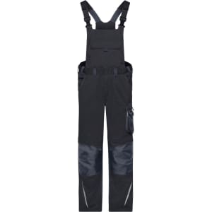 Workwear pants with bib in navy blue, featuring adjustable straps, multiple pockets, and reinforced knees. Includes branding.