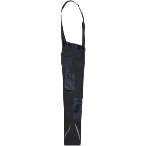 A pair of black workwear pants with bib, featuring multiple pockets and adjustable straps. Brand logo visible.