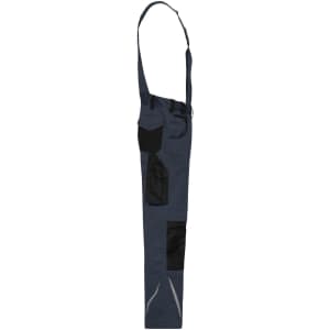 Workwear pants with bib in navy blue featuring black accents and multiple pockets. Includes a logo.