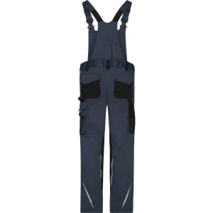 Workwear pants with bib in navy blue, featuring adjustable straps, multiple pockets, and black detailing.