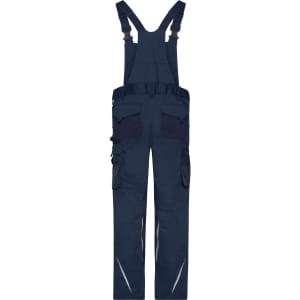 Navy workwear pants with bib, featuring multiple pockets and adjustable straps. Includes reflective detailing and a logo.