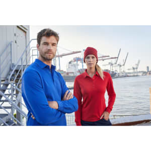 A blue long-sleeve polo shirt worn by a man and a red one worn by a woman, both featuring a logo.