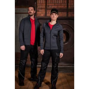 A grey men's stretch fleece jacket worn by a man and a black jacket worn by a woman, both with red shirts underneath.