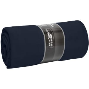 A rolled navy blue fleece blanket with a branded label, featuring a soft and plush texture.