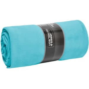 A rolled-up XXL fleece blanket in a vibrant turquoise colour, featuring a black band with branding.