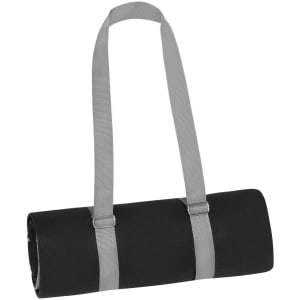 A rolled black picnic blanket secured with grey straps, featuring a logo on the side.